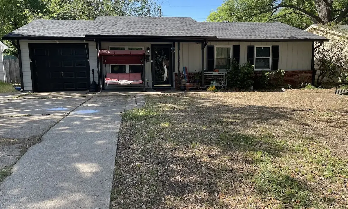 Asphalt Shingle Roof Repair crew at work on a residential roof in University